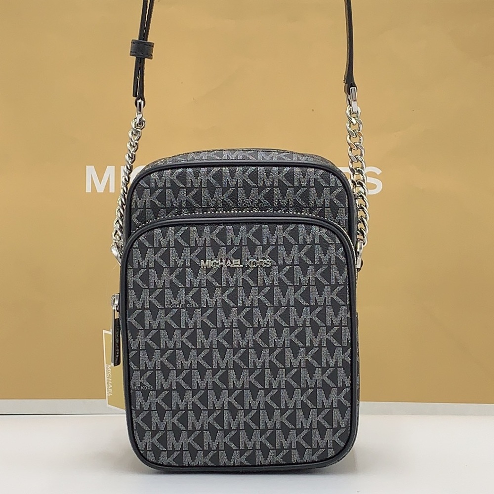 MICHAEL KORS
Jet Set Travel Medium Signature Logo Crossbody
COLOR BLACK SILVER - Picture 7 of 16